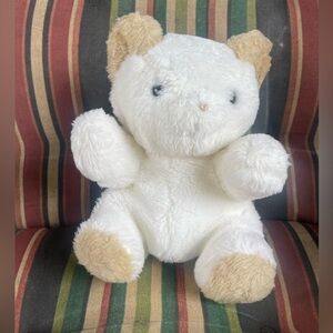 "Sleepytime Smush Bear" from 1988 or a Vintage Eden Windup Musical Bear-works
